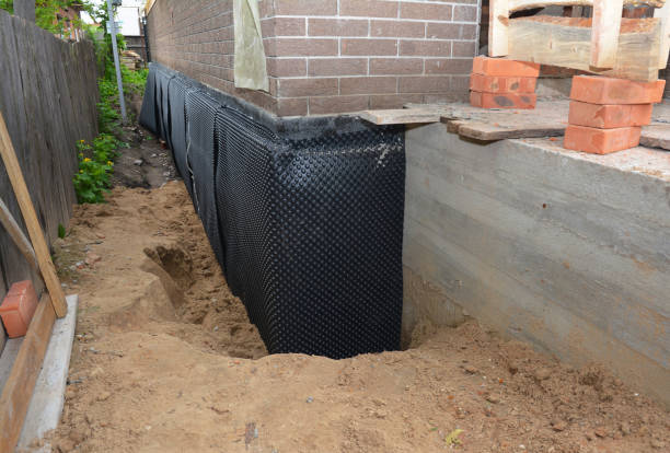 SJ Waterproofing Pros technician performing targeted Waterproofing assessment in Nashville, NC